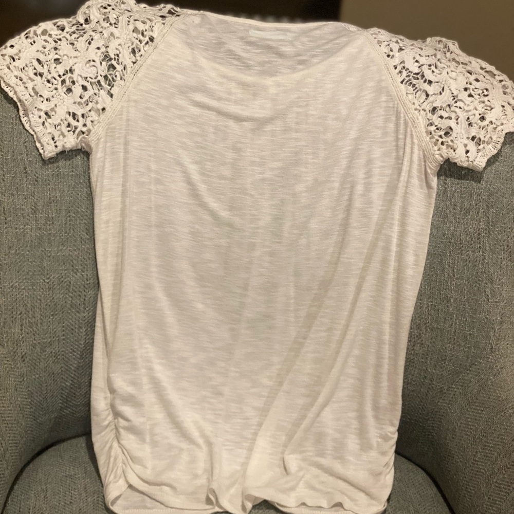 Maurice’s cream and lace top with side ruching. Size M